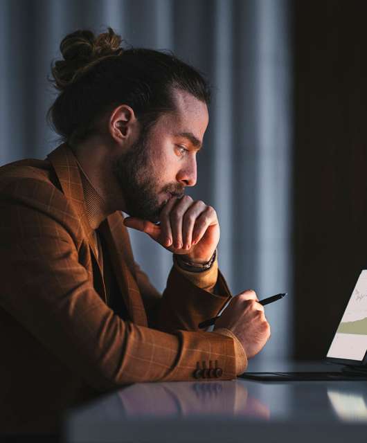 Man looking at tablet