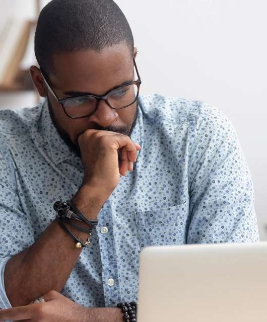 distressed-man-on-laptop