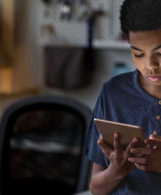 teen-boy-being-cyberbullied-on-tablet